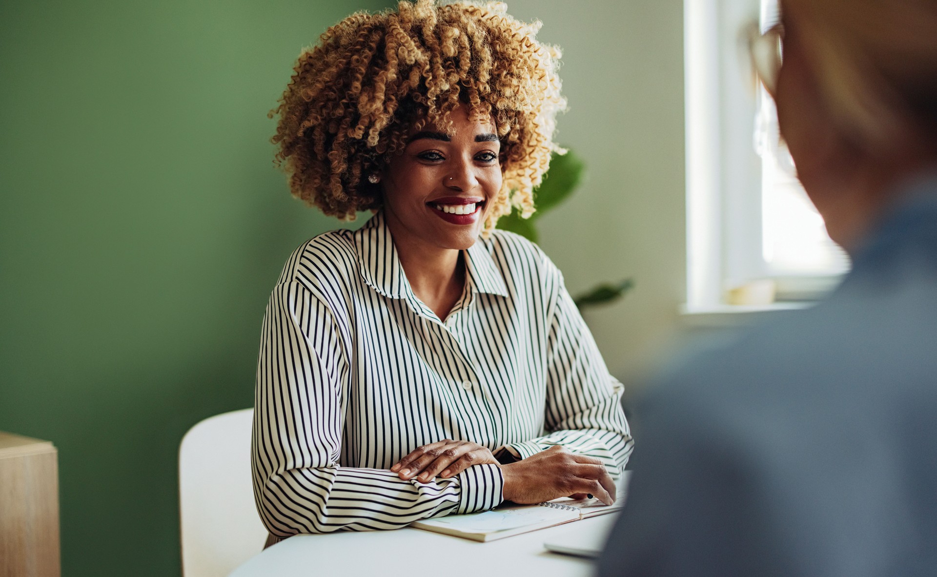 Team Of Two Businesswoman Working Together in a Modern Office